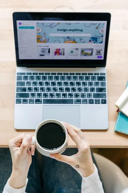 A modern work setting featuring a laptop, tablet, and smartphones, perfect for technology and freelance use.
